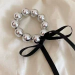 1PC 패션 포니 테일 헤어 로프 블랙 리본 진주 헤어 밴드 고탄성 헤어 타이 가죽 밴드 내구성 머리 머리를 다치게하지 마십시오 - 이미지 2